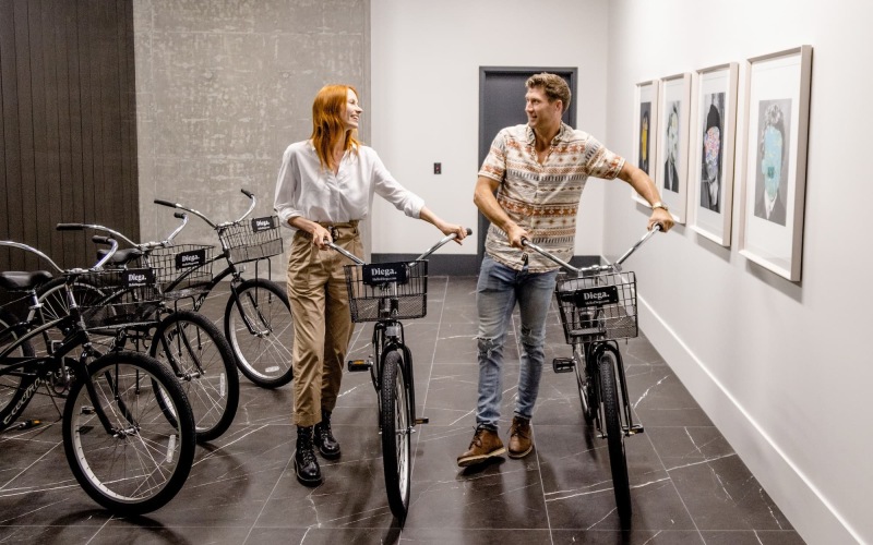 two people on bicycles smiling
