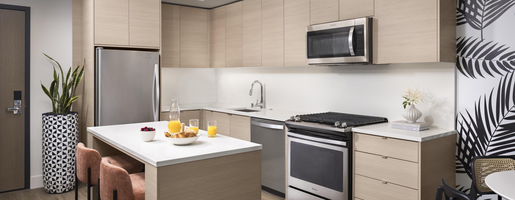 a kitchen with white cabinets