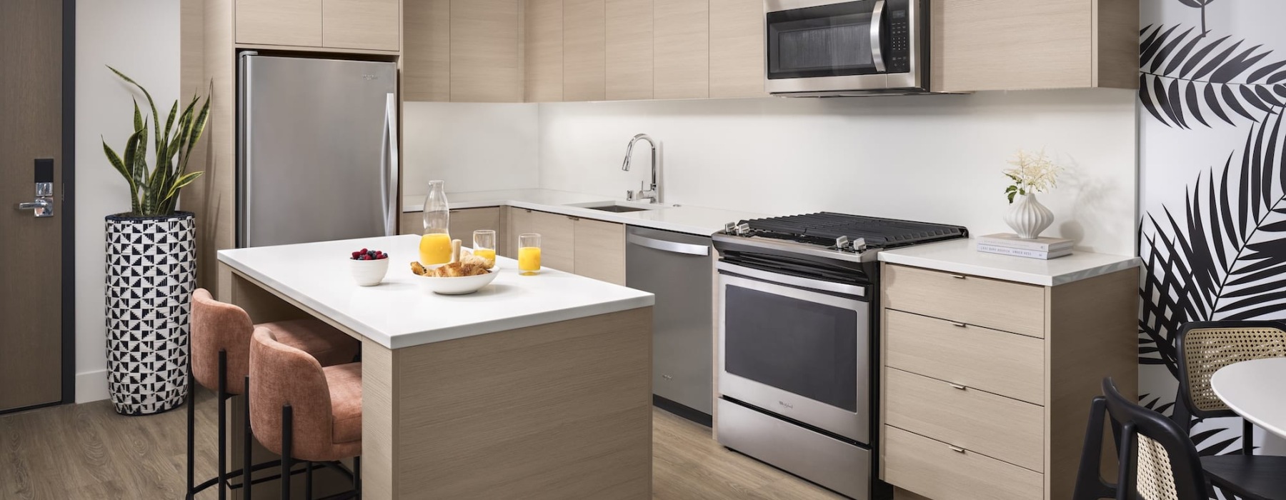 a kitchen with white cabinets